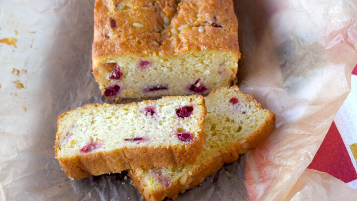 Satisfy your cravings with a delectable slice of my easy Moist Cranberry Orange Quick Bread. It is guaranteed to bring joy to your taste buds. #CranberryWeek #QuickBreadLife #CranberryOrangeGoodness #Homesweethomebaking #FreshFromtheOven