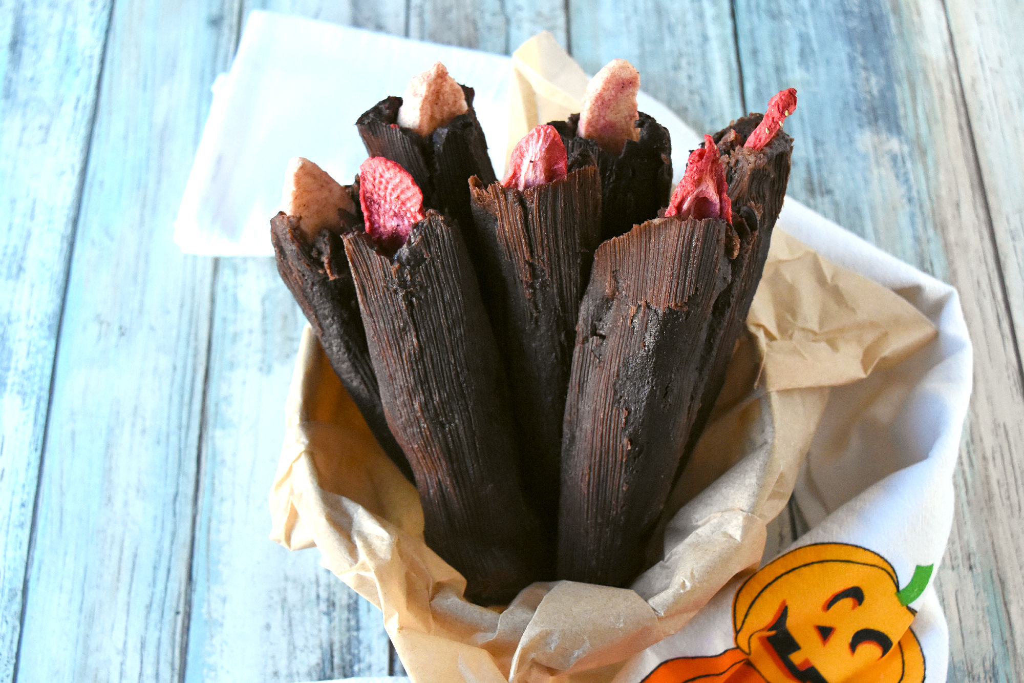 Get ready to be bewitched by these spooktacular Halloween Frostbite Fingers ????????! These creepy, yet delicious treats are perfect for a Halloween party or a frightfully fun snacking experience. #HalloweenTreatsWeek #tamales #chocolatetamale #creepyfood #Halloweenfood #partyfood #Halloweenrecipe