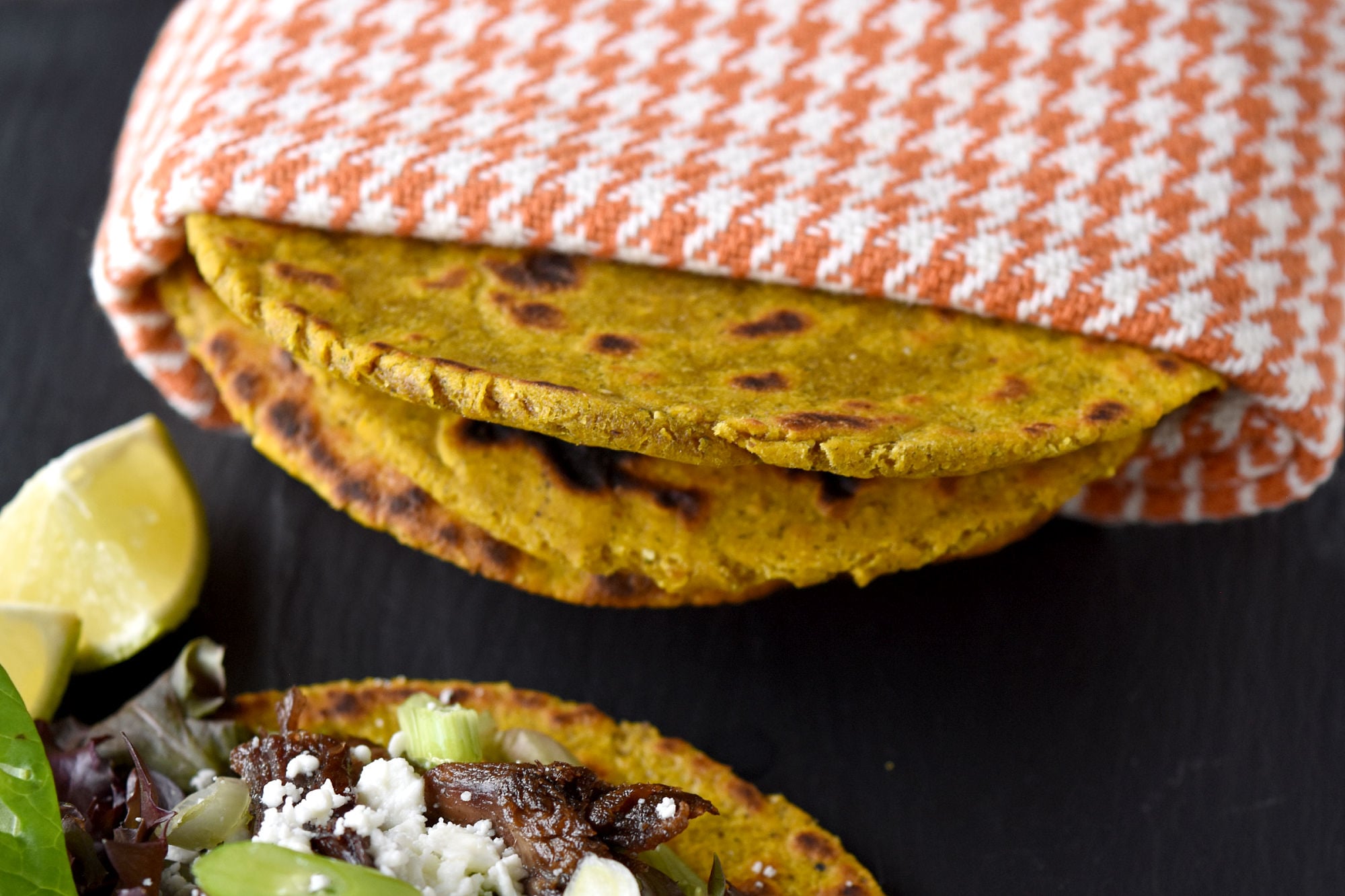 Infusing the warmth of pumpkin with traditional tortilla texture, we're elevating our dinner game to new heights.  Half and Half Pumpkin Tortillas are the best of both corn and flour tortillas combined with rich pumpkin flavor. #PumpkinWeek #AutumnEats #HealthyTacoTuesday #homemadetortillas #bluecorntortillas
