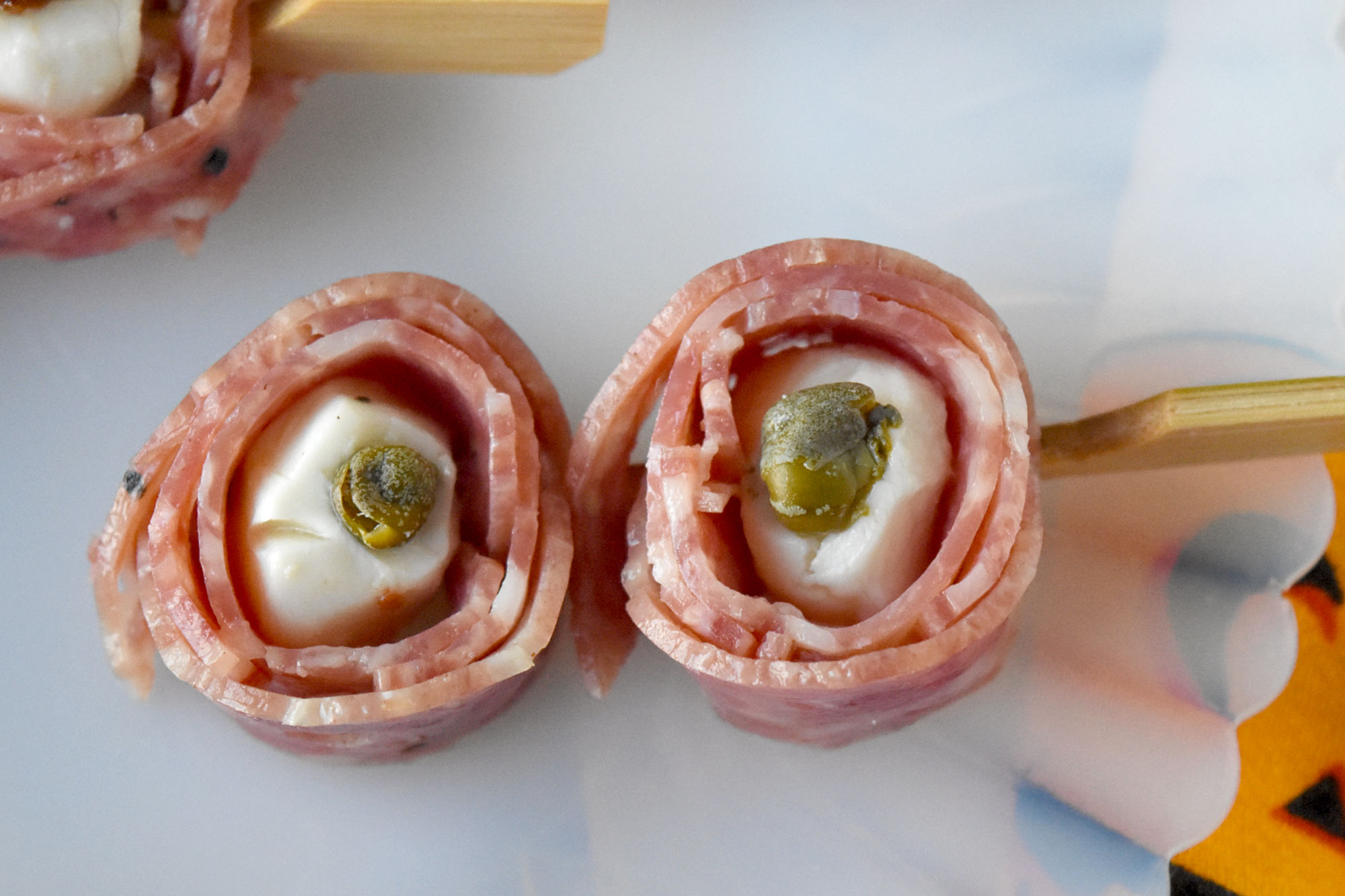 Skewered (Charcuterie) Eyeballs are the perfect centerpiece for your Halloween board! Guaranteed to be the ghostly talk of your Halloween party! ????  #EatDrinkandBeScary #HalloweenTreatsWeek #SpooktacularEats #charcuterie