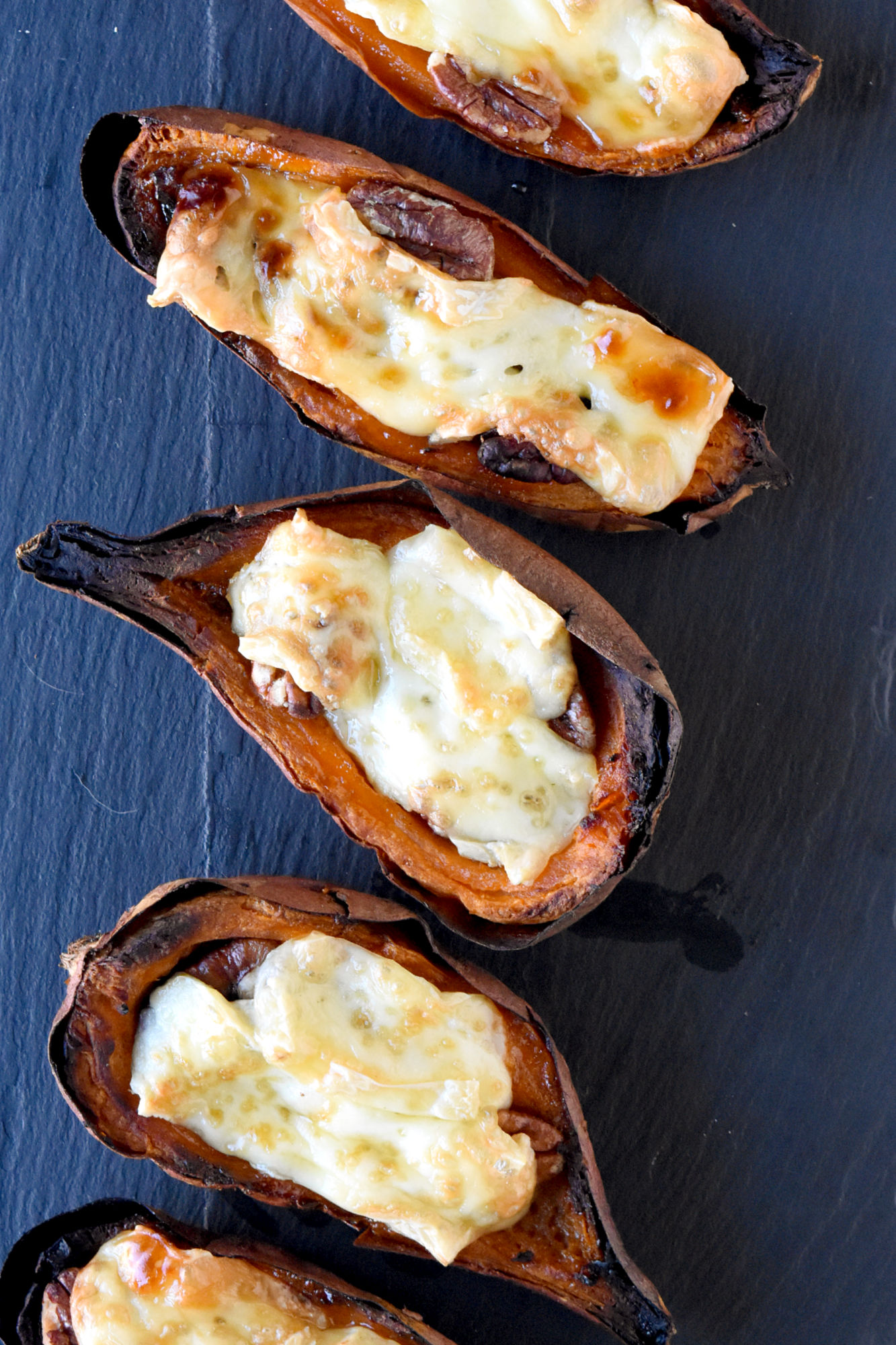 Say goodbye to plain old potato skins and hello to these 4 Ingredient Easy Sweet Potato Skins.  They're sure to be a hit with family and friends. #FoodieHoliday #SweetPotatoSkins #HealthyEats #VeggieLovers #InstaFood #CleanEats
