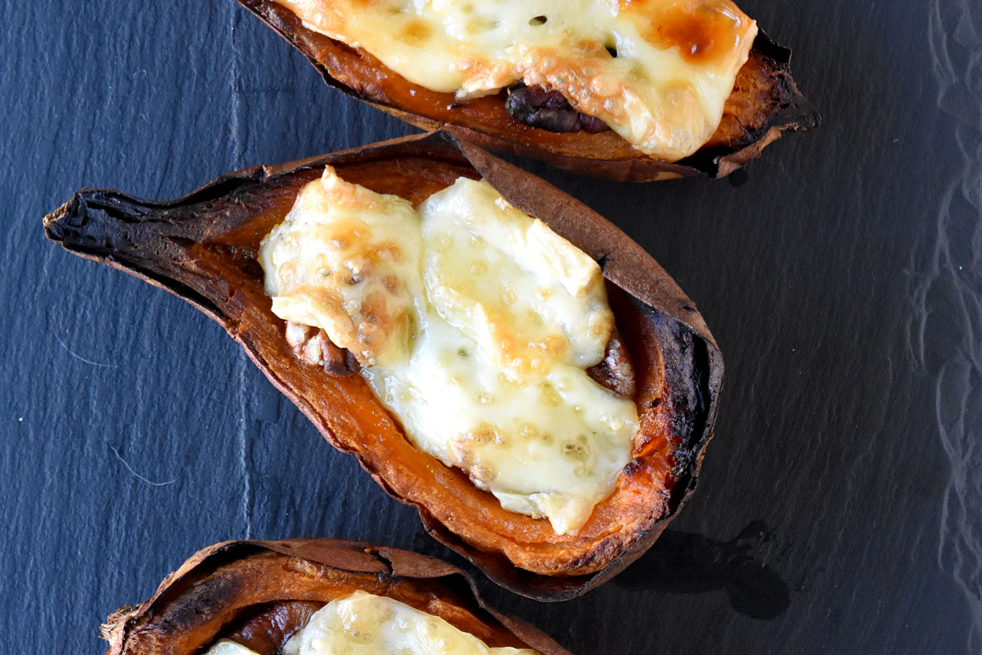 Say goodbye to plain old potato skins and hello to these 4 Ingredient Easy Sweet Potato Skins.  They're sure to be a hit with family and friends. #FoodieHoliday #SweetPotatoSkins #HealthyEats #VeggieLovers #InstaFood #CleanEats
