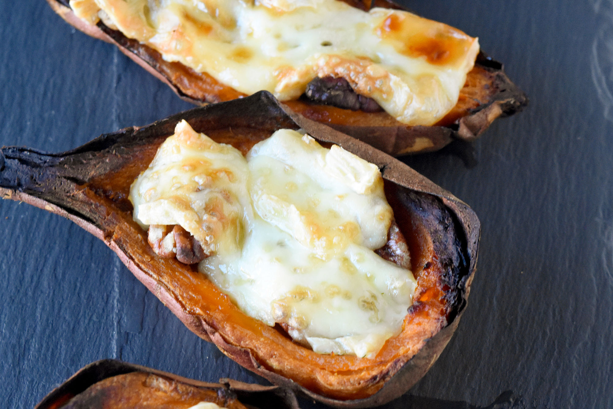 Say goodbye to plain old potato skins and hello to these 4 Ingredient Easy Sweet Potato Skins.  They're sure to be a hit with family and friends. #FoodieHoliday #SweetPotatoSkins #HealthyEats #VeggieLovers #InstaFood #CleanEats
