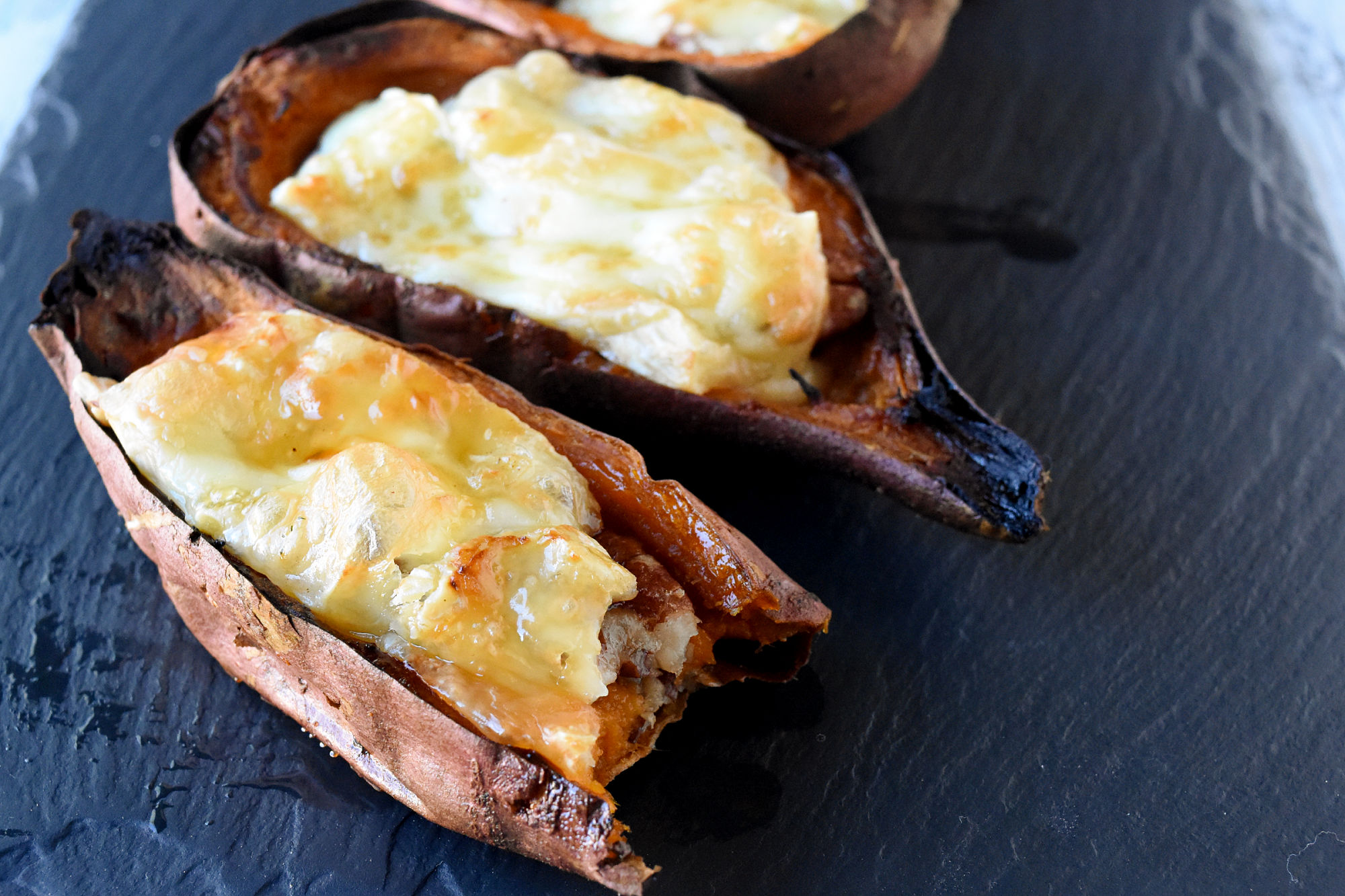 Say goodbye to plain old potato skins and hello to these 4 Ingredient Easy Sweet Potato Skins.  They're sure to be a hit with family and friends. #FoodieHoliday #SweetPotatoSkins #HealthyEats #VeggieLovers #InstaFood #CleanEats
