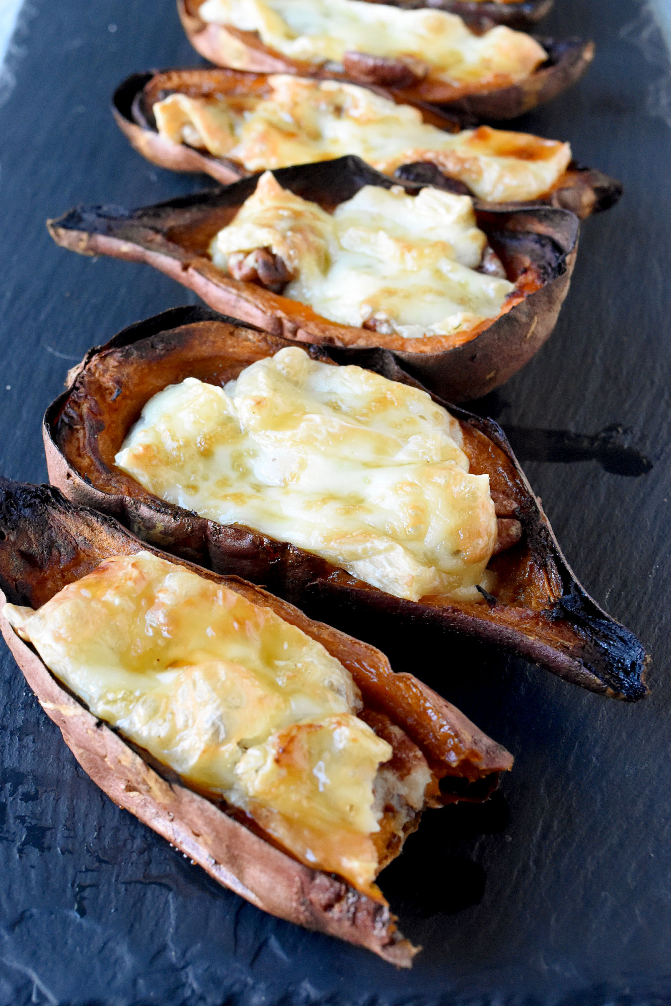 Say goodbye to plain old potato skins and hello to these 4 Ingredient Easy Sweet Potato Skins.  They're sure to be a hit with family and friends. #FoodieHoliday #SweetPotatoSkins #HealthyEats #VeggieLovers #InstaFood #CleanEats
