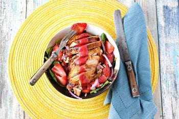 Using in season Florida strawberries, this Strawberry Chicken Spinach Salad is not only packed with strawberry flavor but it’s great a way to start the new year off right! Not only are strawberries in the salad, but they’re in the dressing, too! #StrawberryChickenSpinachSalad #HealthyEating #SummerSaladLover #CleanEatingJourney #WholeFoodsInspired