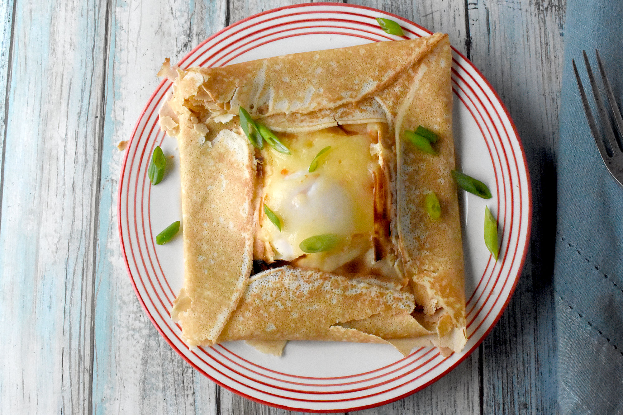 Tex-Mex Breakfast Crepes are the perfect combination of savory and spicy.  Get ready for a flavor fiesta! #TexMexCrepes #BreakfastCrepes #MexicanBreakfast #CrepesofInstagram #FoodieBreakfast
