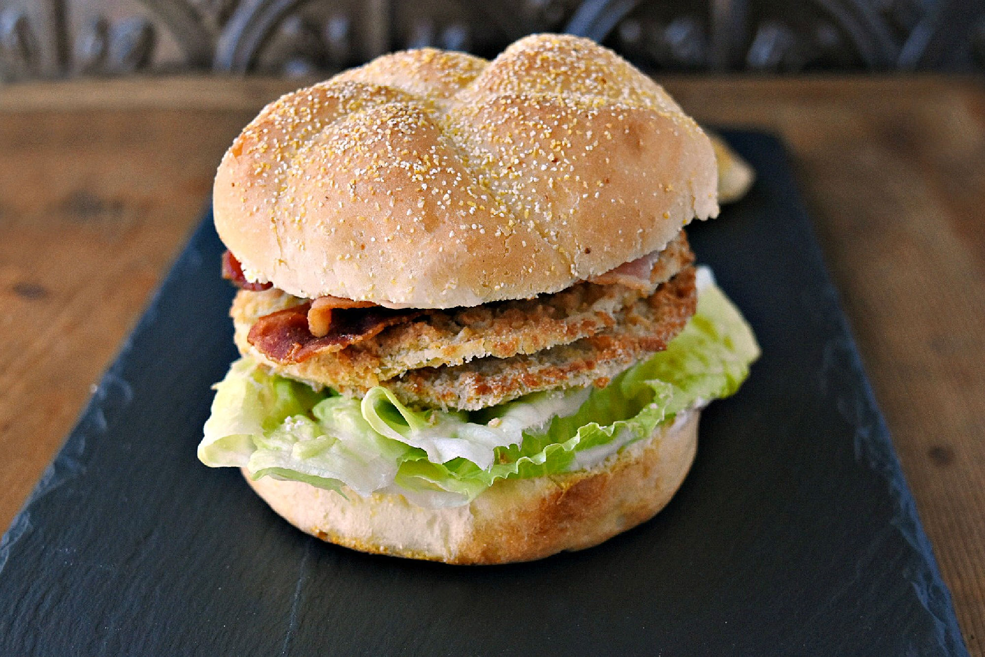 This BLFGT Sandwich has crispy bacon, refreshing lettuce, and tangy fried green tomatoes. It will make your taste buds sing! #BLTdelight #baconloversunite #baconbaconbacon #friedgreentomatolove #sandwichgoals