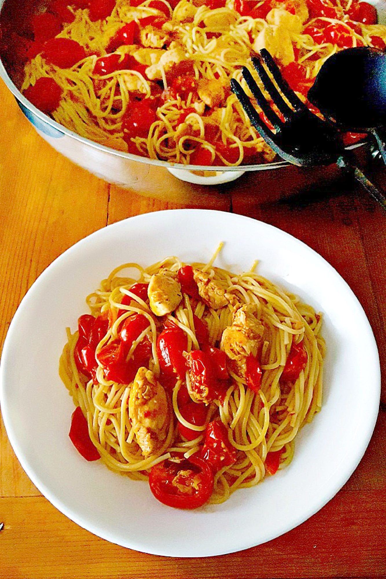 Impress your dinner guests with this deceptively simple Blistered Tomato Pasta with Chicken. The blistered tomatoes add a burst of flavor to the tender chicken and al dente pasta. #inseason #freshtomatoes #tomatopasta #chickenrecipe #chickenandpasta #PastaLoversDelight #FoodieFaves #HealthyEats #TomatoObsessed
