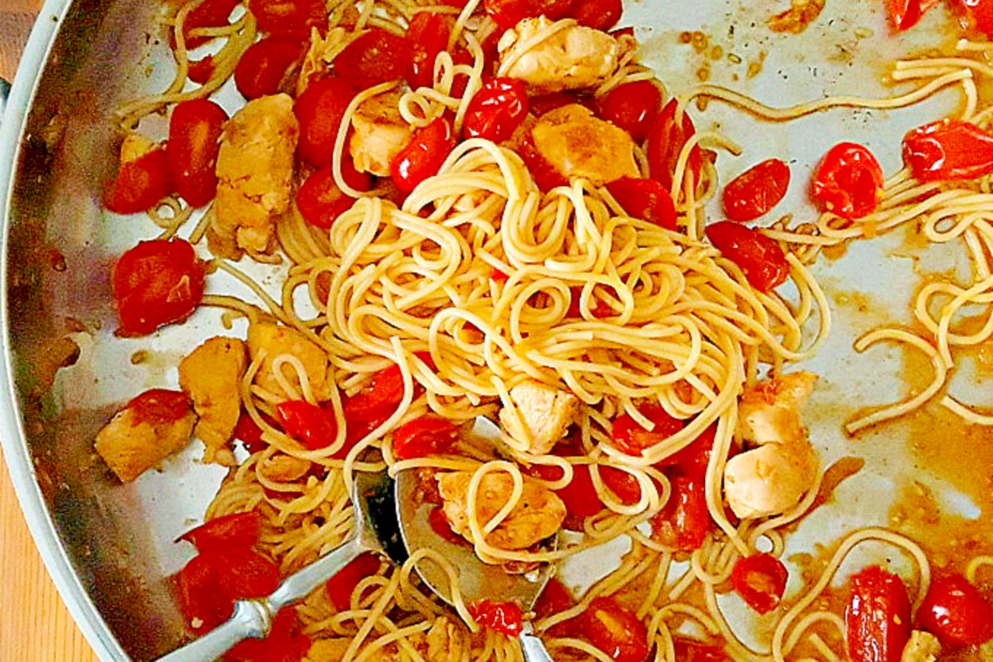 Impress your dinner guests with this deceptively simple Blistered Tomato Pasta with Chicken. The blistered tomatoes add a burst of flavor to the tender chicken and al dente pasta. #inseason #freshtomatoes #tomatopasta #chickenrecipe #chickenandpasta #PastaLoversDelight #FoodieFaves #HealthyEats #TomatoObsessed
