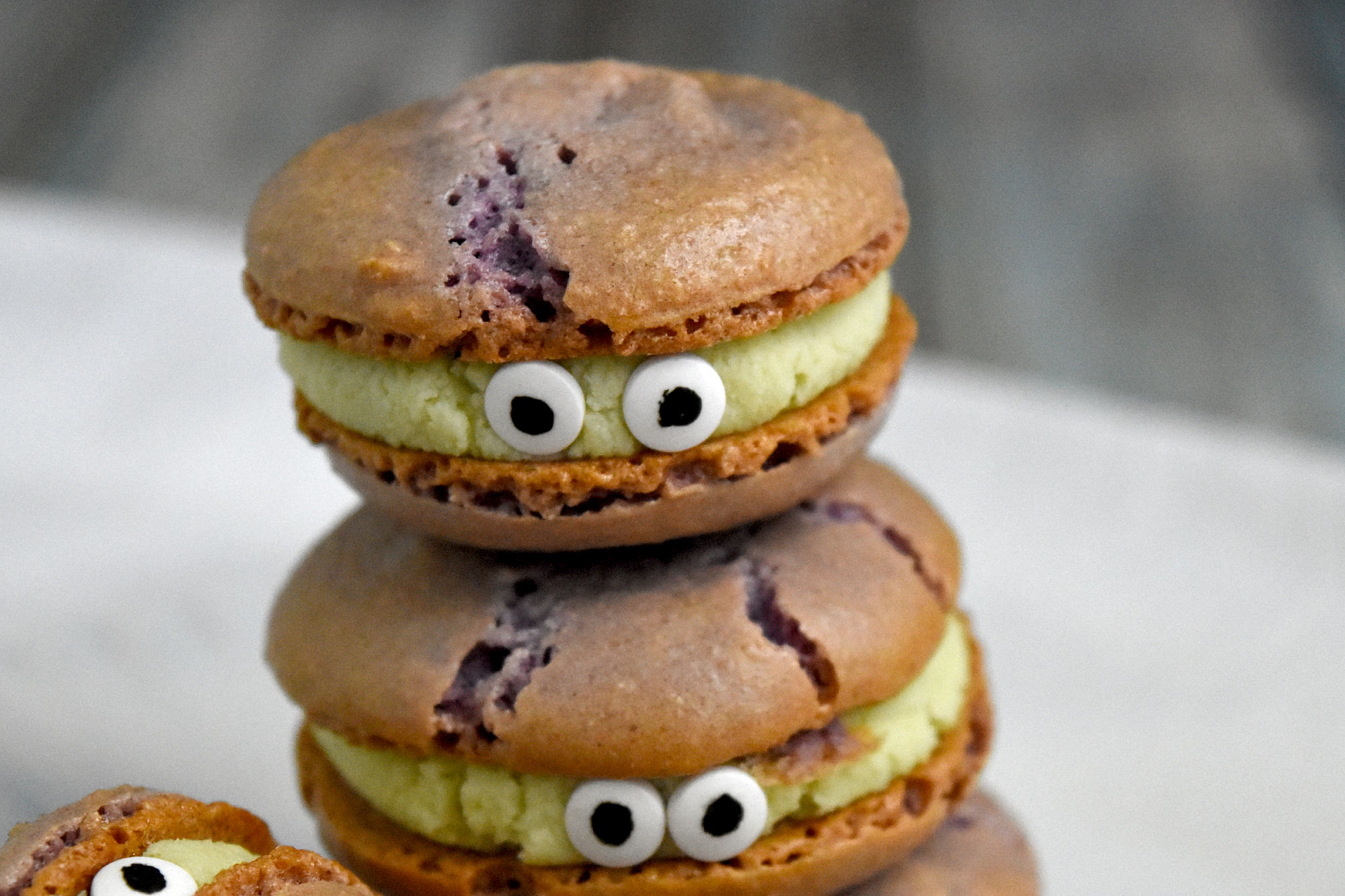 Some say the Purple People Eater Macarons are too pretty to eat...but we say they're too delicious NOT to eat! 😋👀  #PurplePeopleEaterMacarons #MacaronMagic #DeliciousDesserts #FoodieFaves #InstaSweets
