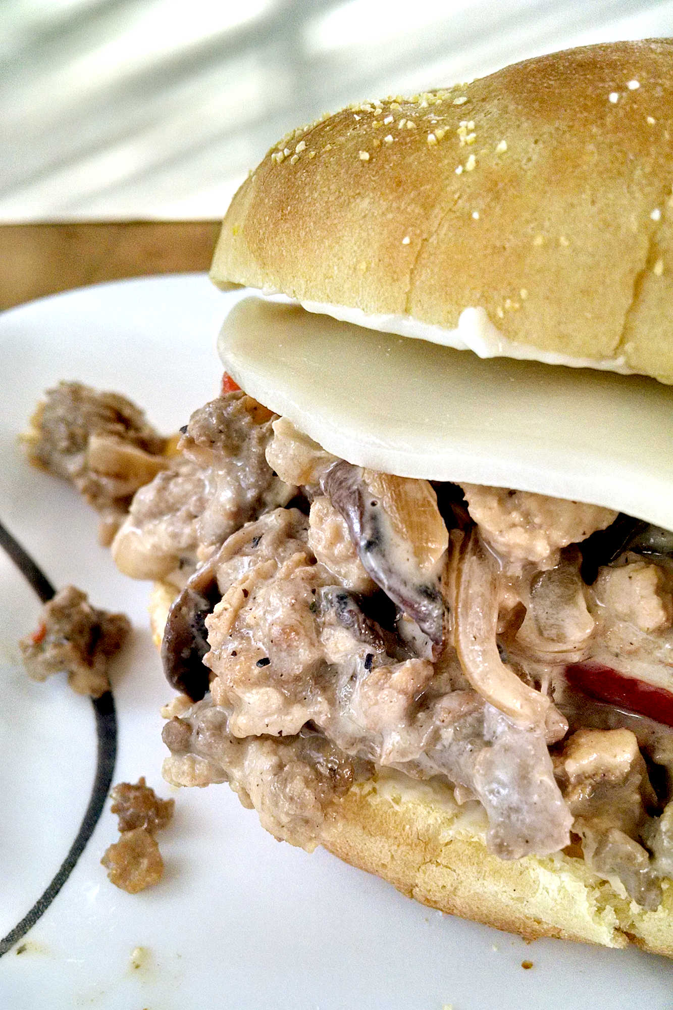 Add a little Philly flair to your next meal with our Turkey Cheesesteak Sloppy Joes. The perfect combination of savory, sweet, and cheesy, you won't be able to resist! #TurkeyCheesesteakSloppyJoes #CheesesteakLovers #FoodieFaves #EasyDinnerIdeas #SandwichObsessed #phillyflavor #weeknightmeal #turkeycheesesteak #sloppyjoes