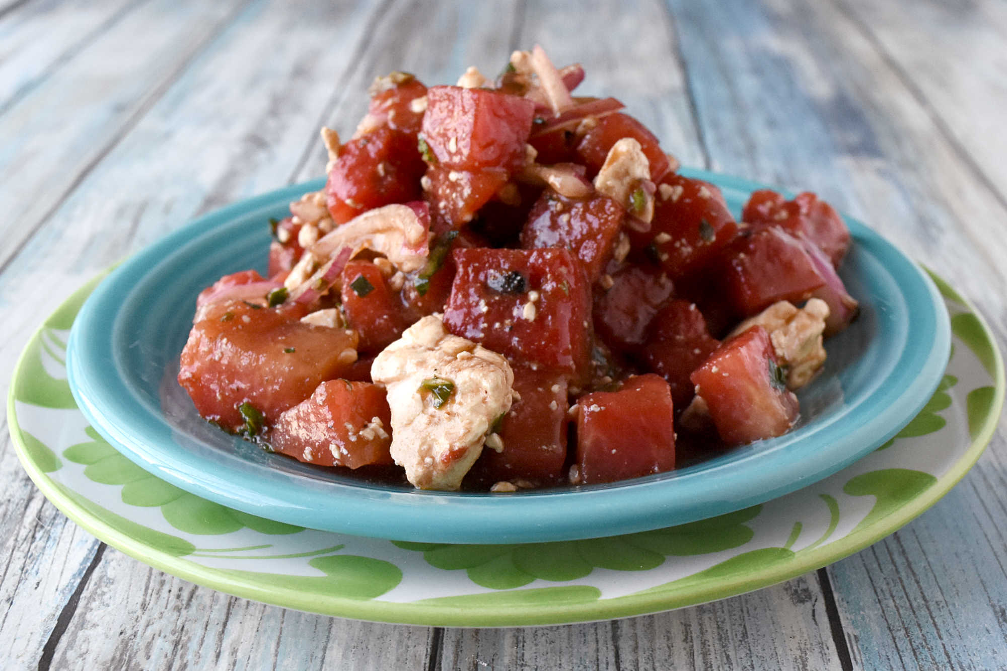 Tired of boring salads? Add a kick of heat and sweetness with our Spicy Watermelon and Feta Salad! Guaranteed to impress your family and friends. #FarmersMarketWeek #SpicyWatermelonFetaSalad #RefreshingSummerSalad #FruityAndSavory #HealthySummerEats #TastySideDishEats