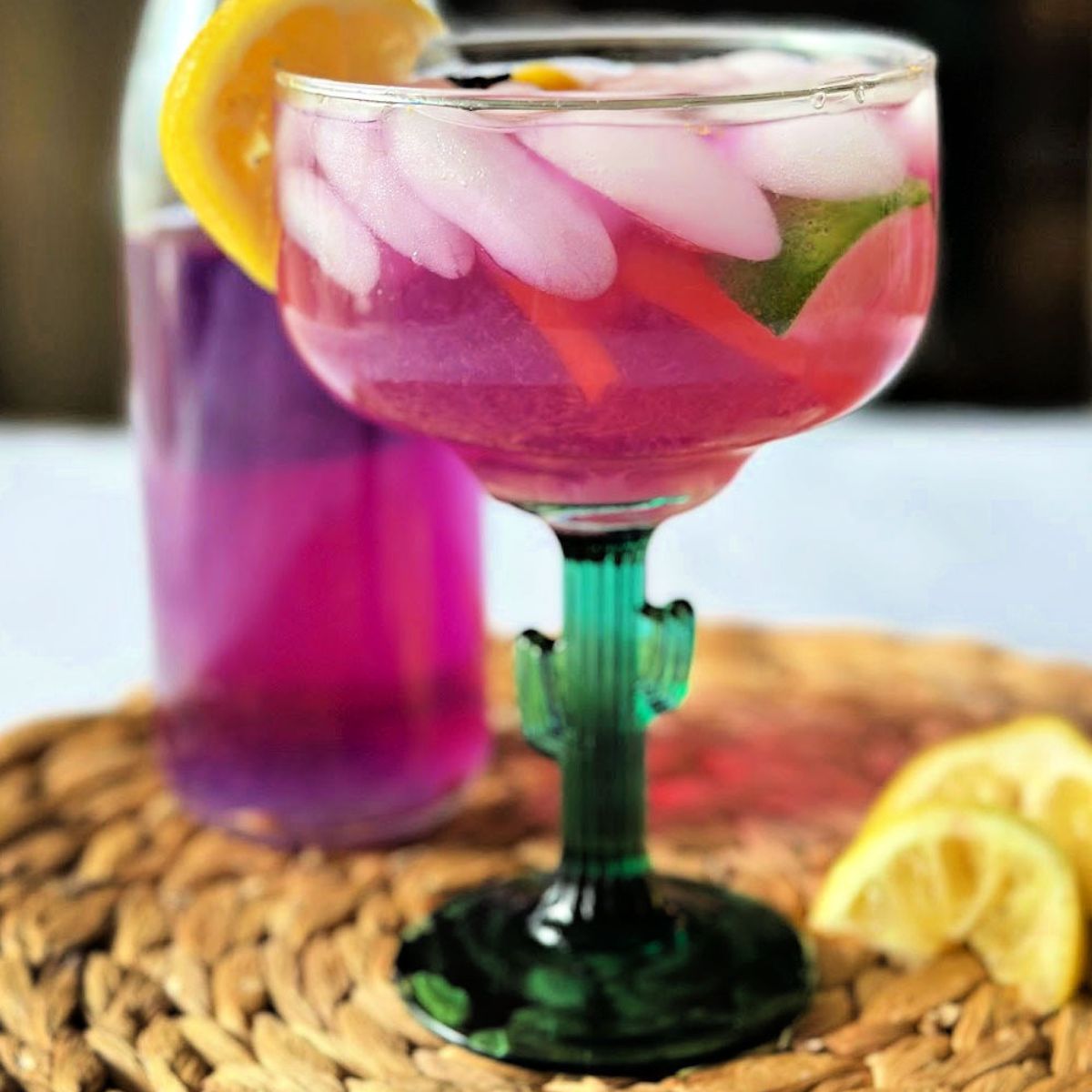 Make a stunning color changing purple margarita with butterfly pea flowers! A magical cocktail perfect for summer parties or Halloween!