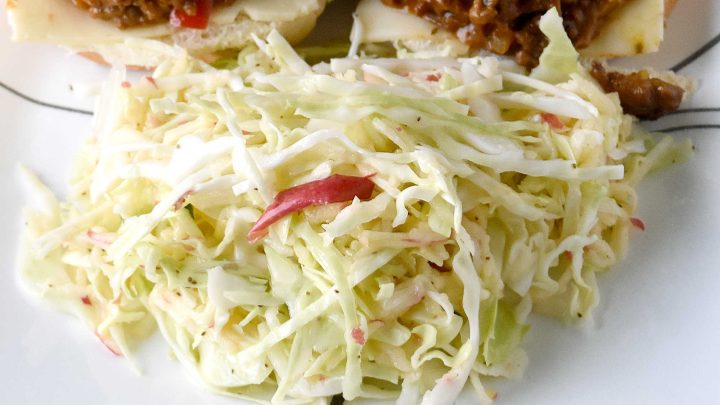 Upgrade your coleslaw game with a crunchy and refreshing easy apple slaw. Perfect for tailgating, potlucks, or as a side dish for any meal. #HealthyEatsWithEase #NoFussFruitSalad #EffortlessAppleSlaw #QuickAndNutritious #FruitAndVeggieFix