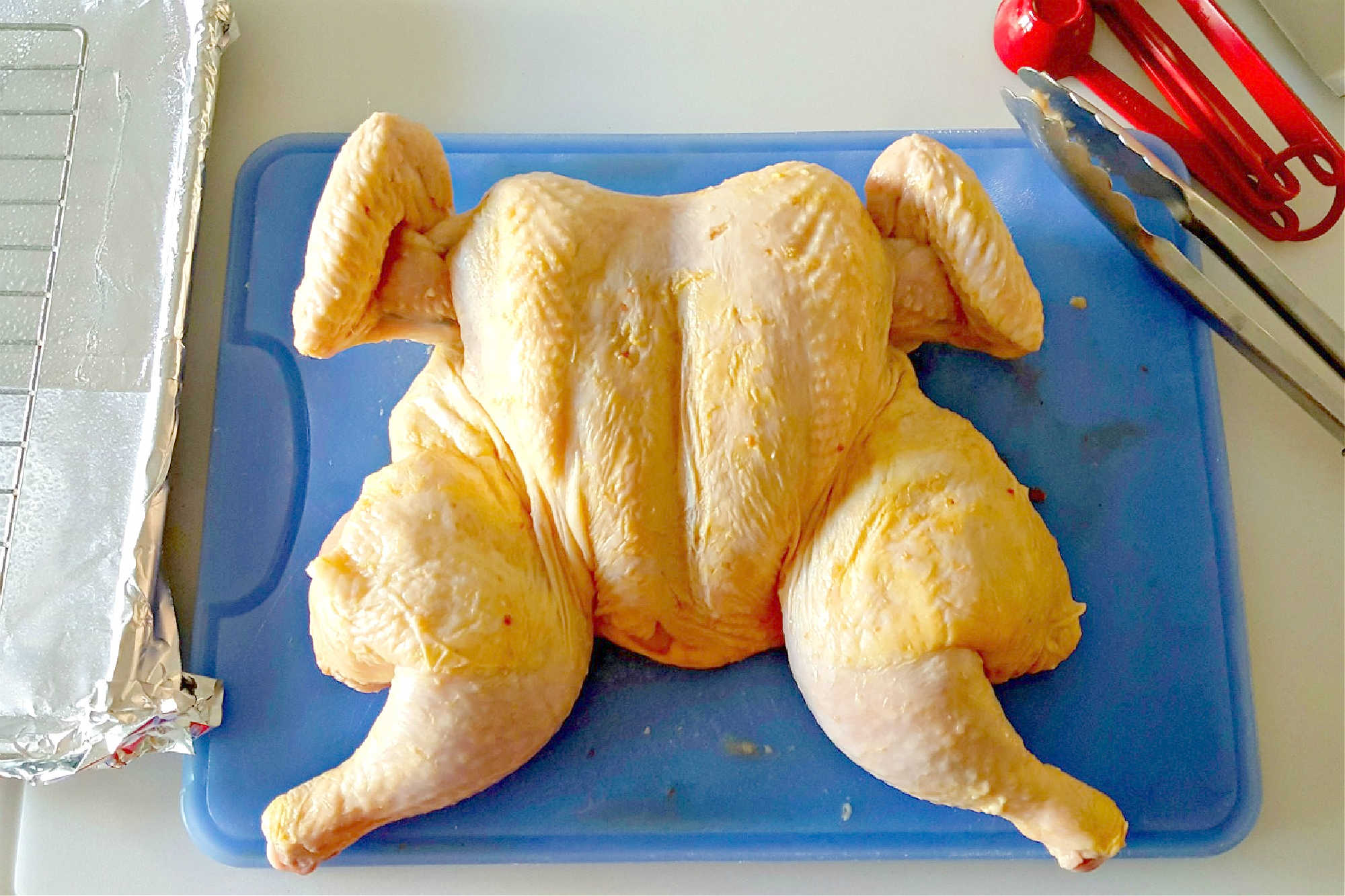 Spice up your weeknight dinner routine with our German Spiced Spatchcocked Chicken. It's quick, easy, and bursting with flavor! Plus, it's a fun way to try a new cooking technique. #spatchcockedchicken #Germanspices #quickdinner #chickendinner #GermanSpices #SpatchcockedChicken #EasyDinnerIdeas #GermanSpicedSpatchcockedChicken  #FlavorfulFowl #DeliciousDinnerIdeas #CookingWithSpices