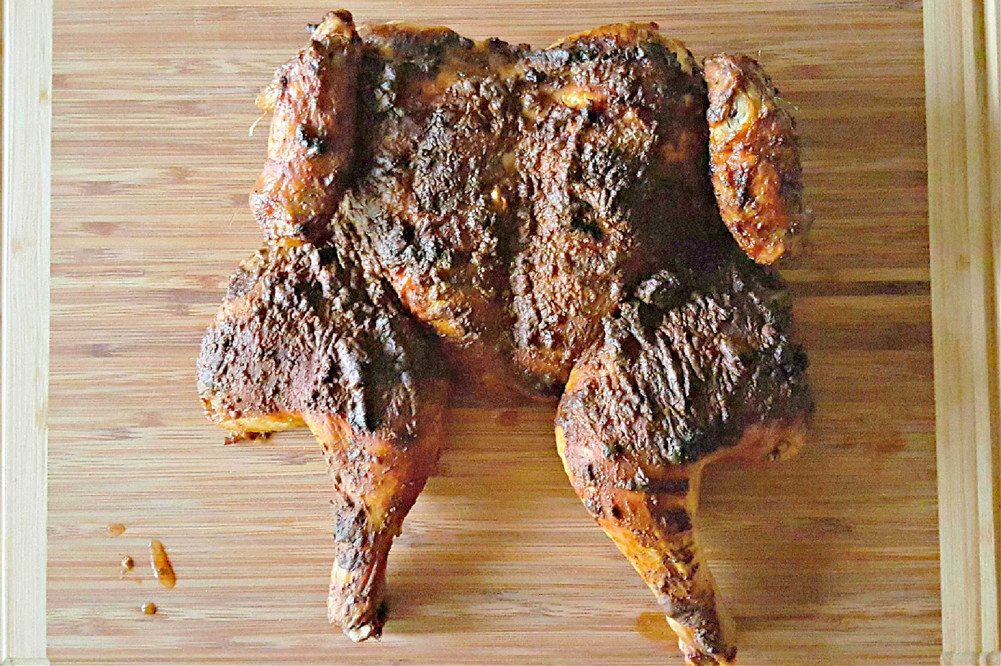 Spice up your weeknight dinner routine with our German Spiced Spatchcocked Chicken. It's quick, easy, and bursting with flavor! Plus, it's a fun way to try a new cooking technique. #spatchcockedchicken #Germanspices #quickdinner #chickendinner #GermanSpices #SpatchcockedChicken #EasyDinnerIdeas #GermanSpicedSpatchcockedChicken  #FlavorfulFowl #DeliciousDinnerIdeas #CookingWithSpices