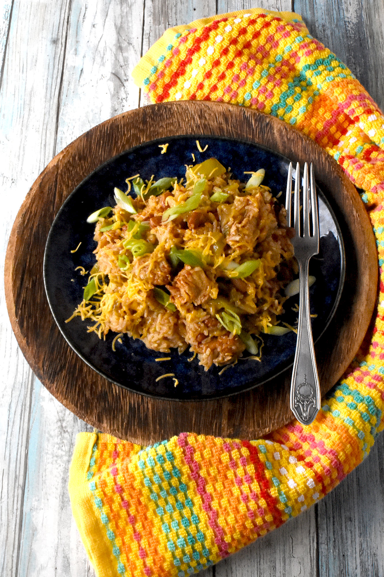 Raise your hand if you love a good one-pot meal! This Green Chile Chicken and Rice is the perfect combination of spicy and savory. Plus it's minimal clean up, maximum flavor! #OurFamilyTable #WeeknightDinner #GreenChileChicken #RiceRecipes #EasyWeeknightDinner #SpicyEats #GreenChileEats #OnePotMeals #SouthwestFlavors #RiceBowls #SpicySatisfaction