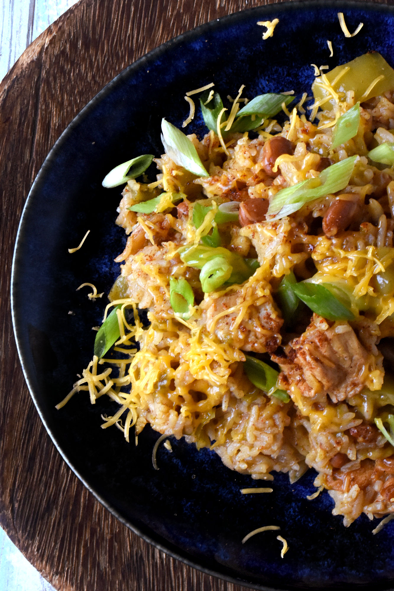 Raise your hand if you love a good one-pot meal! This Green Chile Chicken and Rice is the perfect combination of spicy and savory. Plus it's minimal clean up, maximum flavor! #OurFamilyTable #WeeknightDinner #GreenChileChicken #RiceRecipes #EasyWeeknightDinner #SpicyEats #GreenChileEats #OnePotMeals #SouthwestFlavors #RiceBowls #SpicySatisfaction
