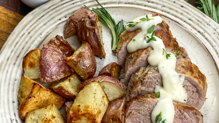 This Air Fryer Pork Tenderloin with Roasted Garlic Sauce is special enough to serve on a holiday or at a dinner party but simple enough to serve as an everyday meal.