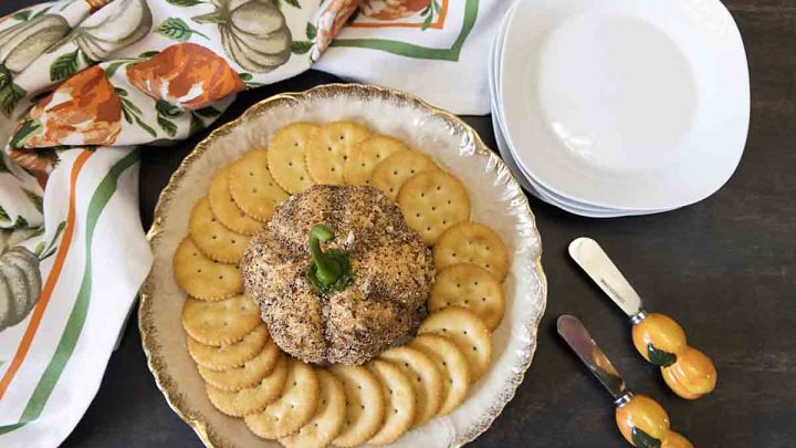 Cute and seasonal with a hint of heat, this Pumpkin Cheese Ball is a crowd-pleasing appetizer that’s perfect for fall.