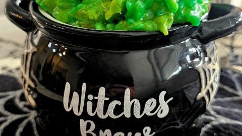 This spooky green risotto recipe is creamy, cheesy, and the perfect Halloween dinner idea for little ghouls and grown-up witches alike.