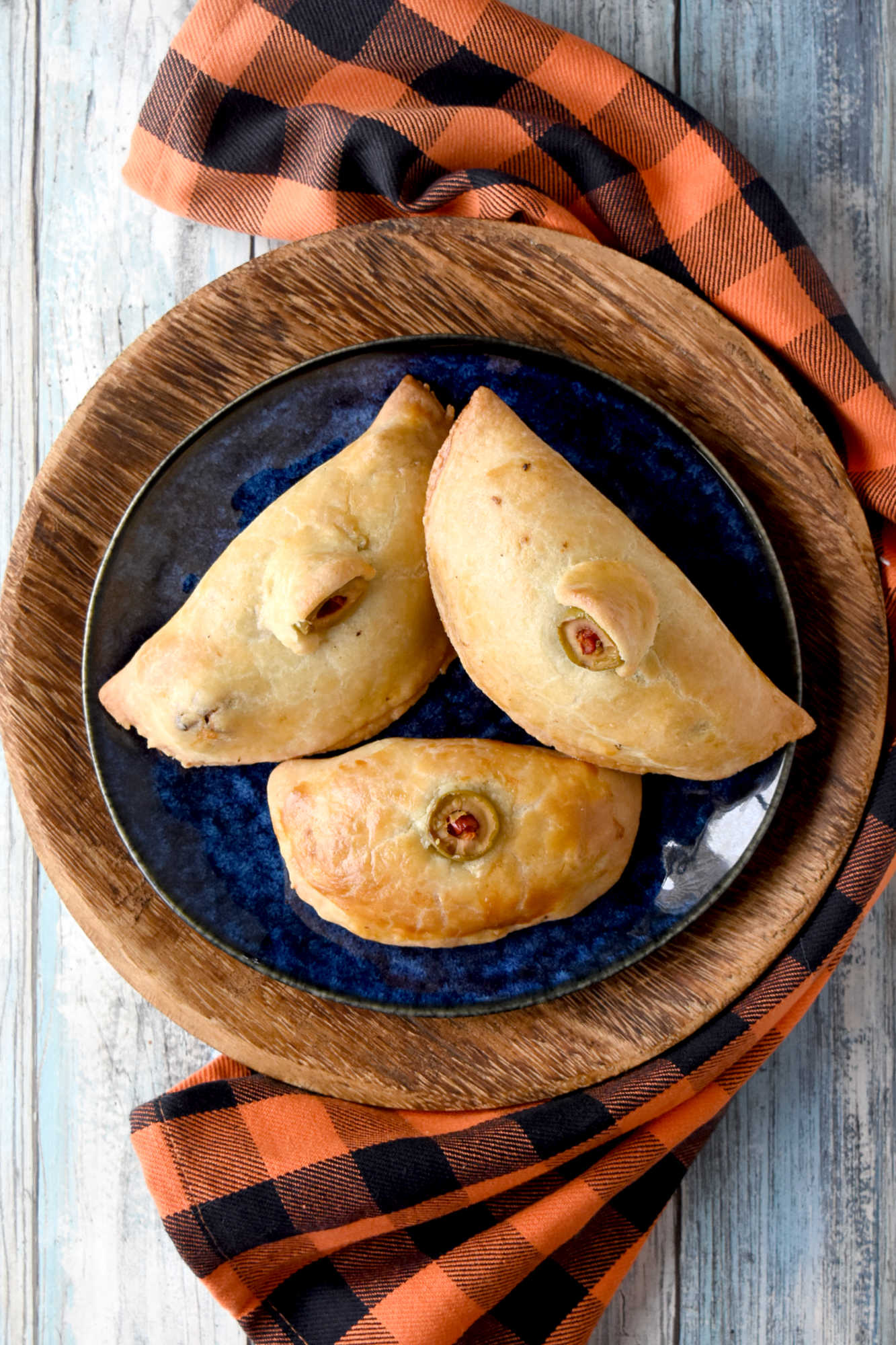 Serve up some shivers at your next get-together with Monster Meat hand Pies.  They bring lively conversation and spooky snacking to the table. Try making them for your Halloween party and see everyone’s reactions. #HalloweenRecipes #SpookySavoryPies #GhoulishGourmet #MonsterMeals #FrightfullyDelicious