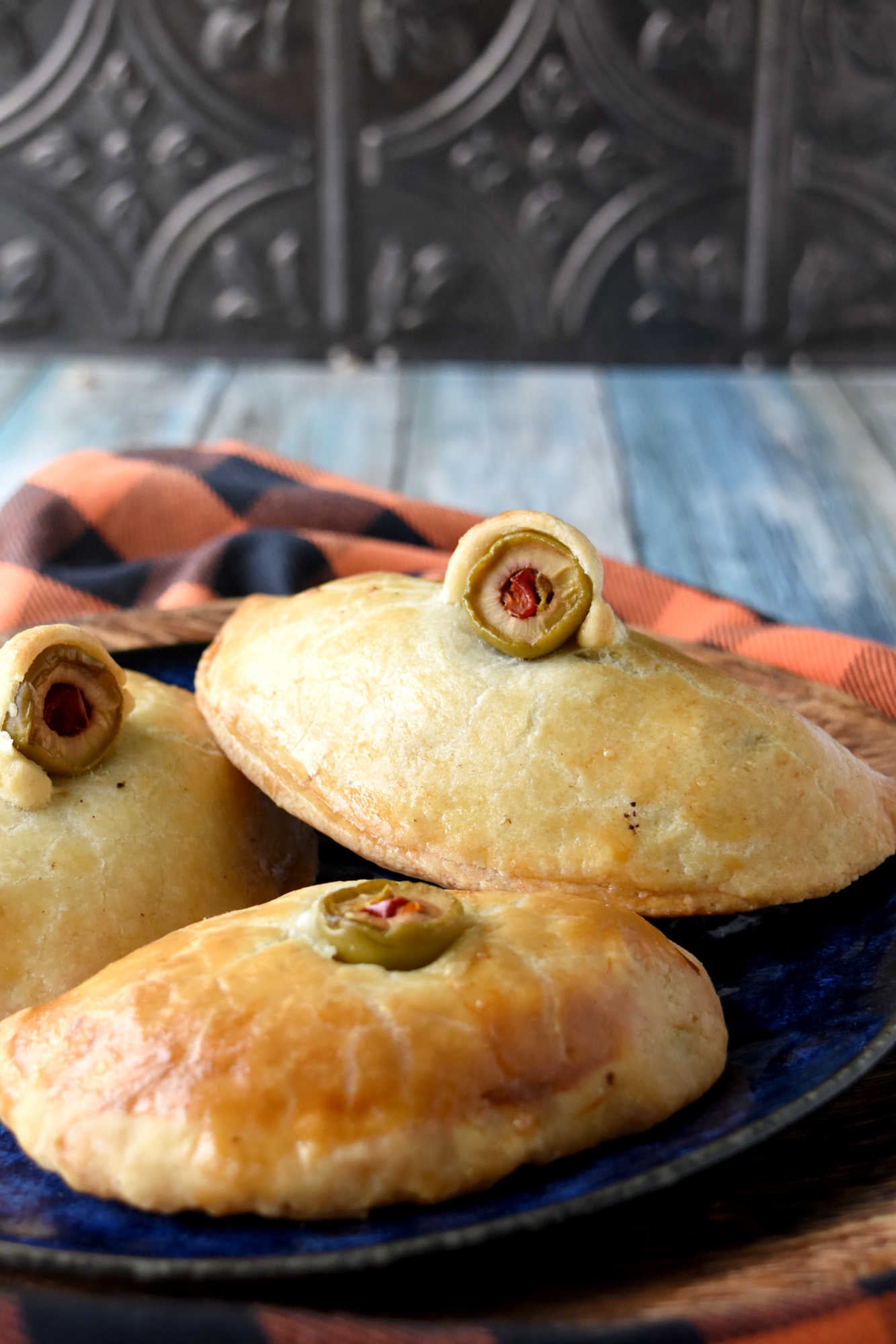 Serve up some shivers at your next get-together with Monster Meat hand Pies.  They bring lively conversation and spooky snacking to the table. Try making them for your Halloween party and see everyone’s reactions. #HalloweenRecipes #SpookySavoryPies #GhoulishGourmet #MonsterMeals #FrightfullyDelicious