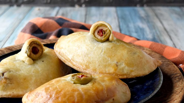 Serve up some shivers at your next get-together with Monster Meat hand Pies. They bring lively conversation and spooky snacking to the table. Try making them for your Halloween party and see everyone’s reactions. #HalloweenRecipes #SpookySavoryPies #GhoulishGourmet #MonsterMeals #FrightfullyDelicious
