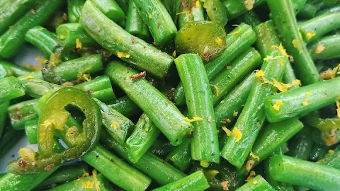 These Easy Jalapeño Green Beans are sautéed in olive oil, seasoned with shallot pepper and salt, then finished with lemon zest.