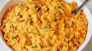 Made in the slow cooker with brown sugar and butter, this Smashed Sweet Potatoes and Apples recipe is an easy side for weeknights and a hit at holiday dinners.