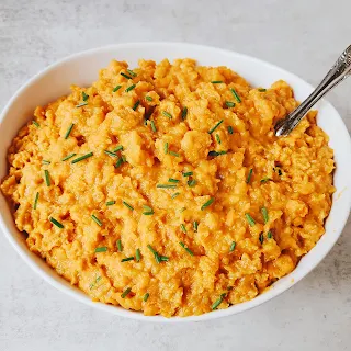 Made in the slow cooker with brown sugar and butter, this Smashed Sweet Potatoes and Apples recipe is an easy side for weeknights and a hit at holiday dinners.