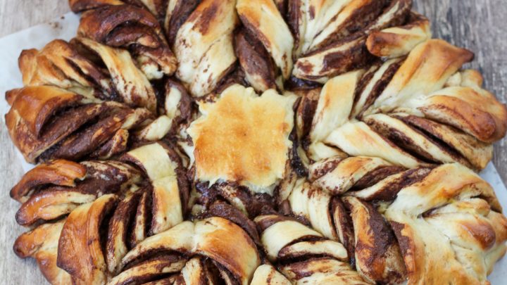 If you want to wow your guests this holiday season, be sure and make this Sourdough Chocolate Christmas Star Bread.