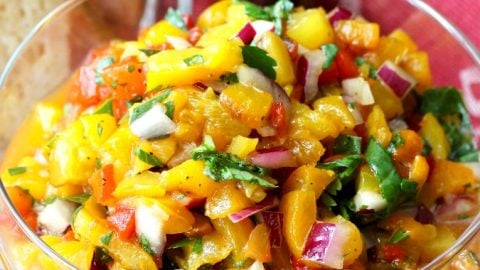 Roasted tricolored pepper salsa: Bell peppers in three colors that are roasted in the oven, peeled and chopped, and tossed with red onion, basil, cilantro, white wine vinegar, olive oil and a bit of sugar and pepper.