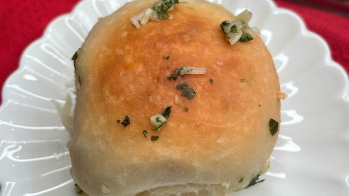 These cheese stuffed garlic rolls are soft, golden rolls bursting with gooey cheese with a generous buttery garlic spread, baked to perfection! Each bite is warm, melty comfort!