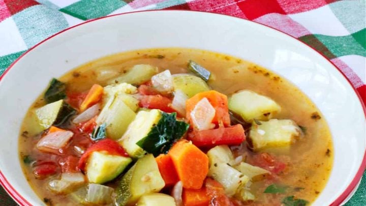 This simple summer vegetable soup recipe is so flexible and versatile. Pick up your favorite summer vegetables at the farmers' market and use them to make this fresh and easy soup.