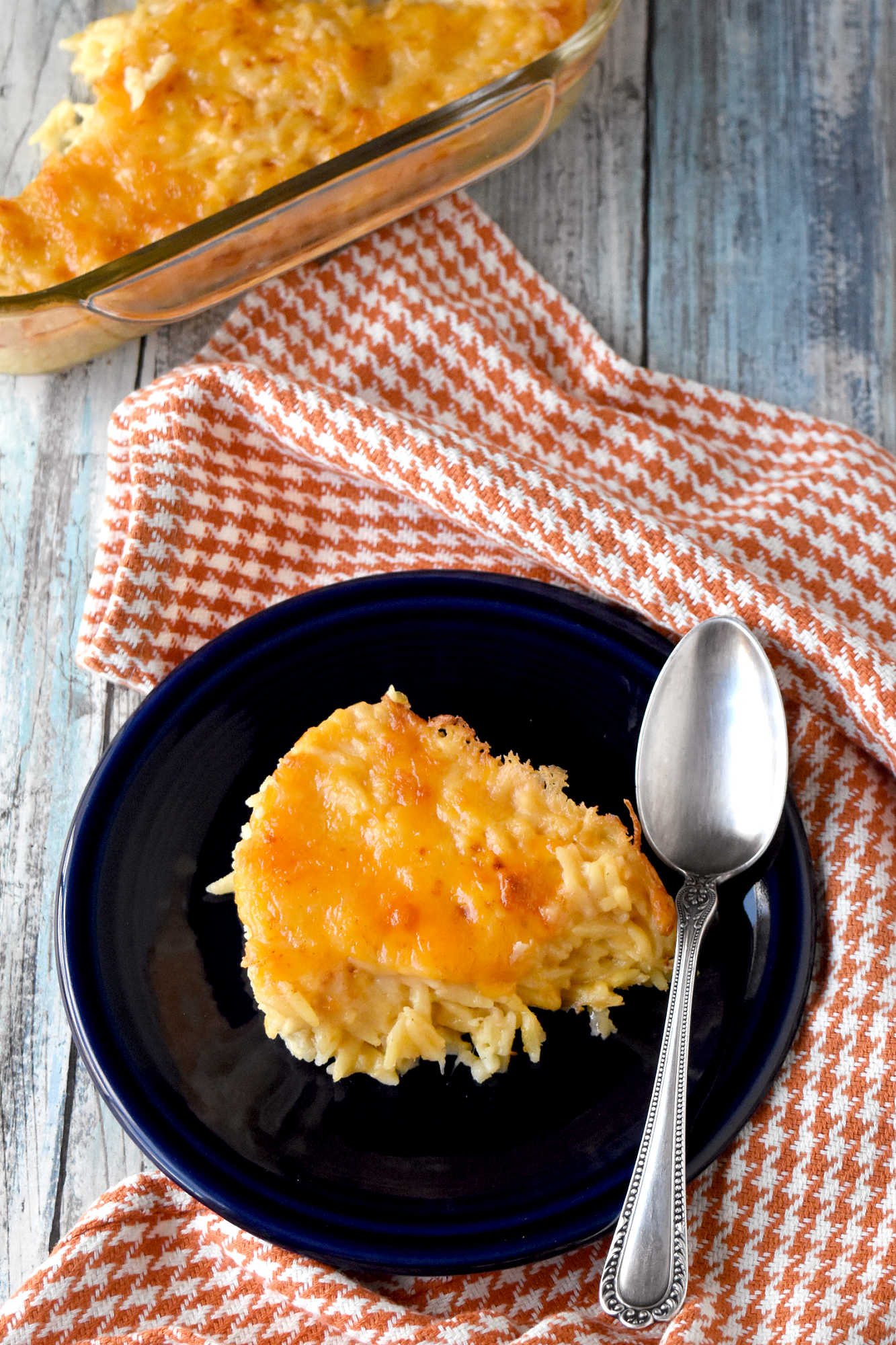 Take your cooking skills to the next level with Creamy Baked Orzo. Discover how this simple yet flavorful dish can add sophistication and elegance to your meals.  It will impess even the most discerning palates. #OrzoObsessed #CreamyComfortFood #OnePotWonders #ItalianInspiredEats #PastaPerfection
