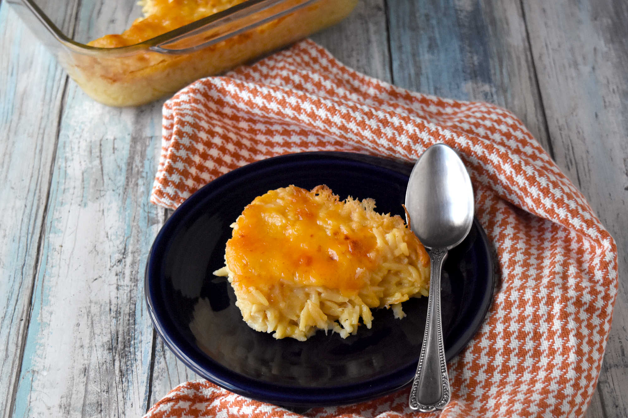 Take your cooking skills to the next level with Creamy Baked Orzo. Discover how this simple yet flavorful dish can add sophistication and elegance to your meals.  It will impess even the most discerning palates. #OrzoObsessed #CreamyComfortFood #OnePotWonders #ItalianInspiredEats #PastaPerfection
