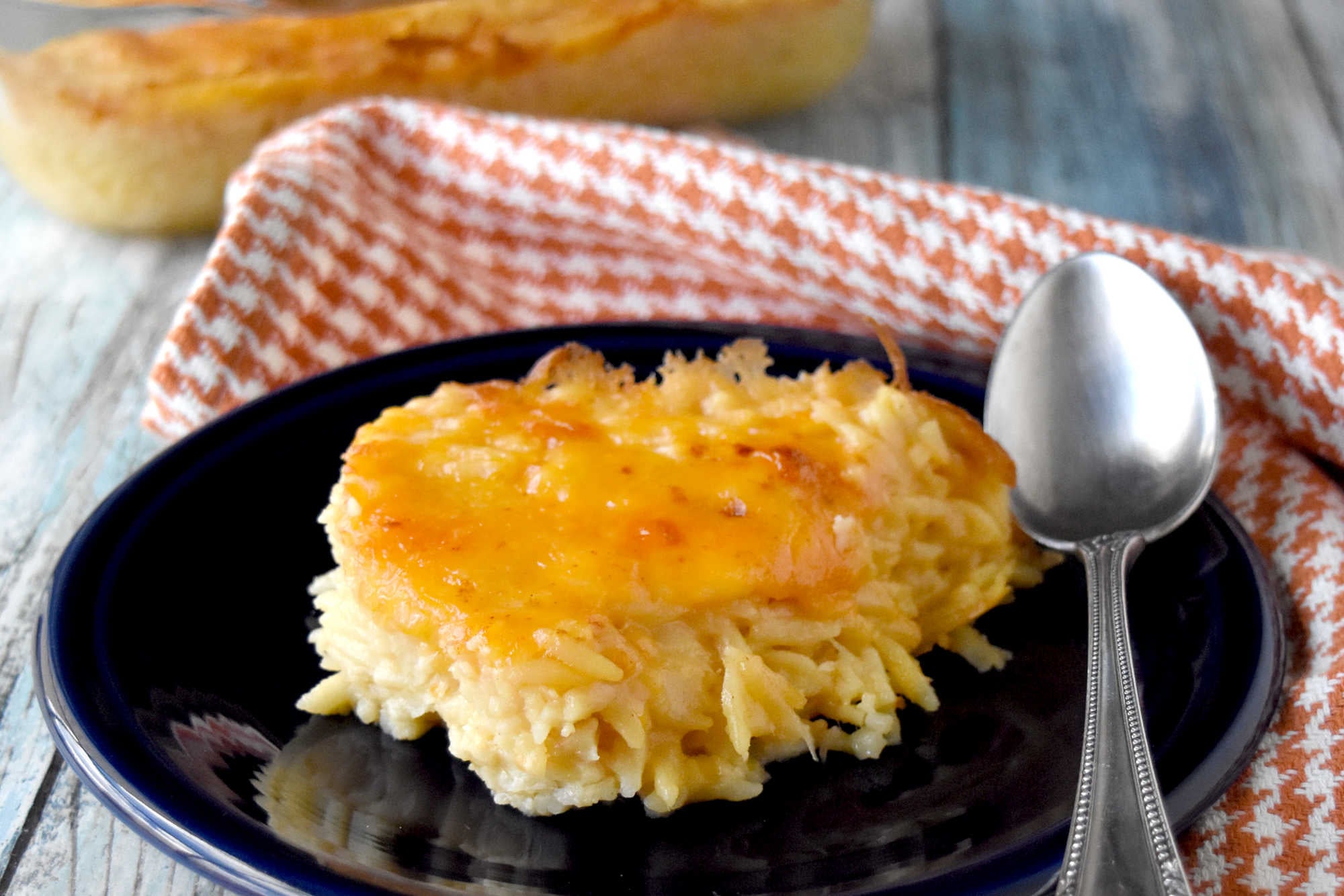 Take your cooking skills to the next level with Creamy Baked Orzo. Discover how this simple yet flavorful dish can add sophistication and elegance to your meals.  It will impess even the most discerning palates. #OrzoObsessed #CreamyComfortFood #OnePotWonders #ItalianInspiredEats #PastaPerfection