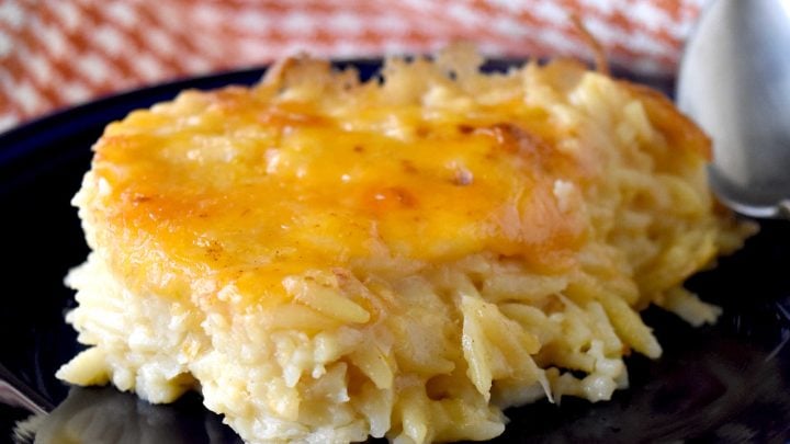 Take your cooking skills to the next level with Creamy Baked Orzo. Discover how this simple yet flavorful dish can add sophistication and elegance to your meals. It will impess even the most discerning palates. #OrzoObsessed #CreamyComfortFood #OnePotWonders #ItalianInspiredEats #PastaPerfection