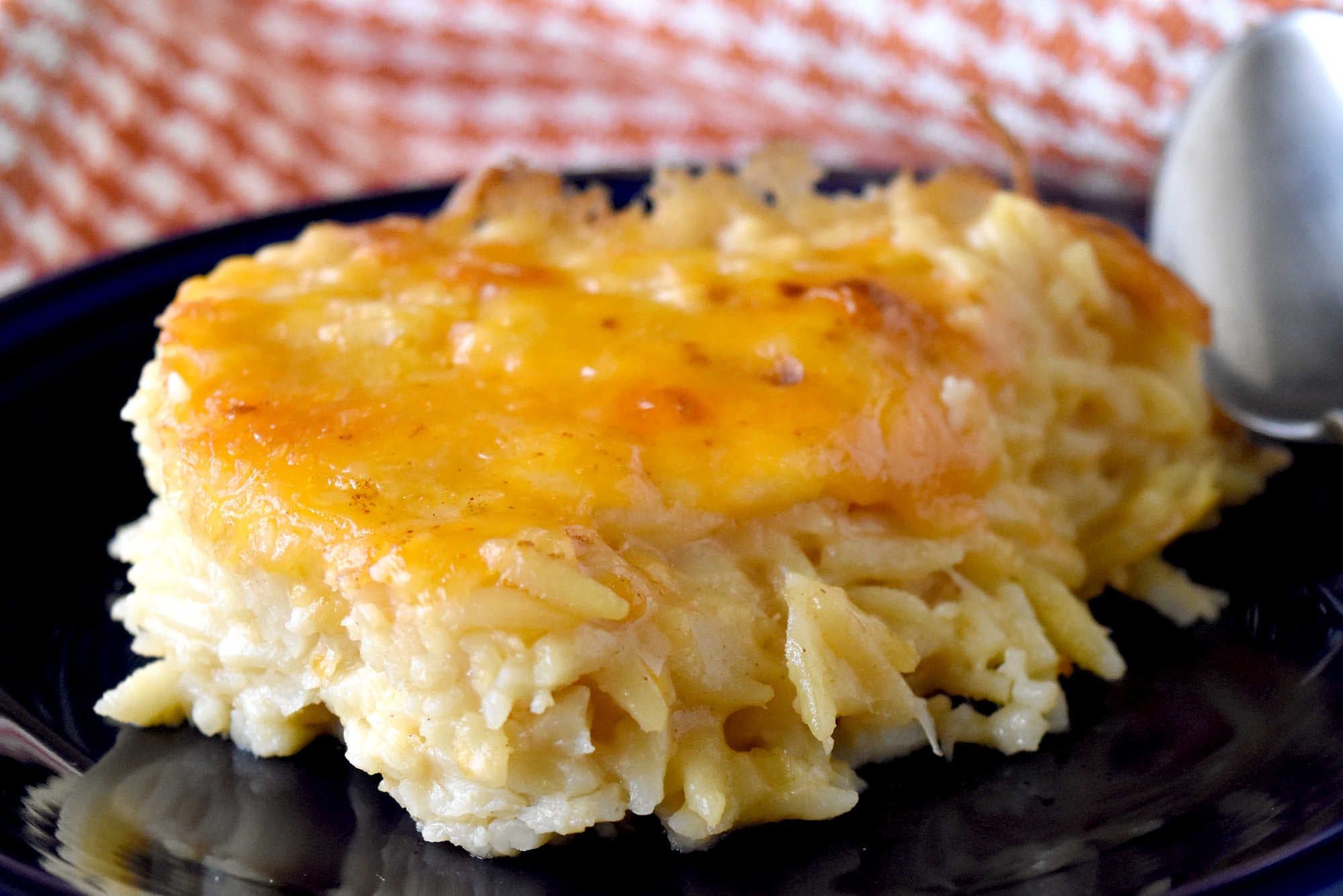 Take your cooking skills to the next level with Creamy Baked Orzo. Discover how this simple yet flavorful dish can add sophistication and elegance to your meals.  It will impess even the most discerning palates. #OrzoObsessed #CreamyComfortFood #OnePotWonders #ItalianInspiredEats #PastaPerfection