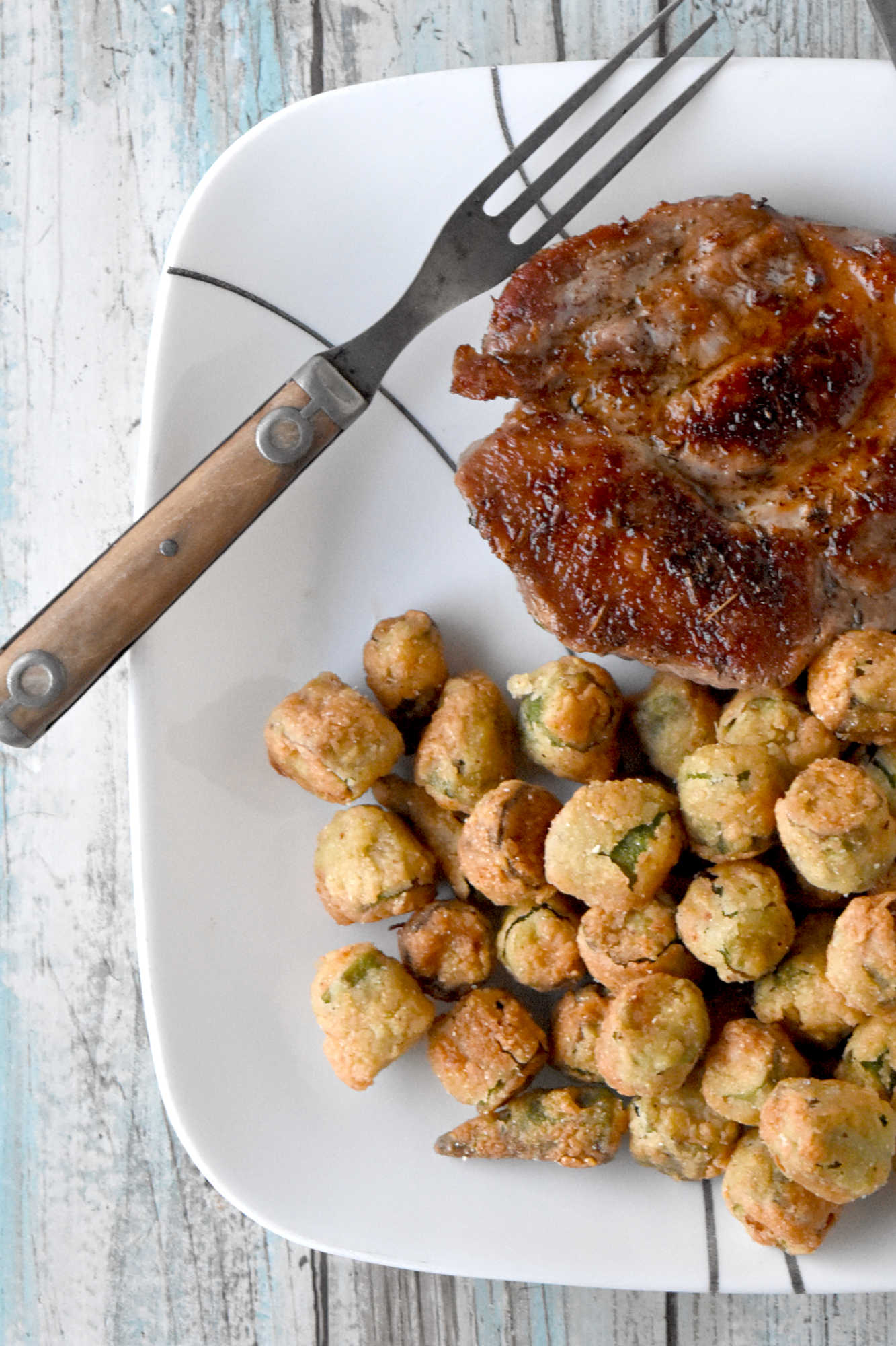 Crispy southern fried okra instantly brings a touch of southern charm to your table. These crunchy, golden bites are the perfect excuse to linger a little longer around the holiday table. #HolidaySideDish #southernfoodlove #okralove #friedfoodheaven #southernfavourites #southerncookingdelights