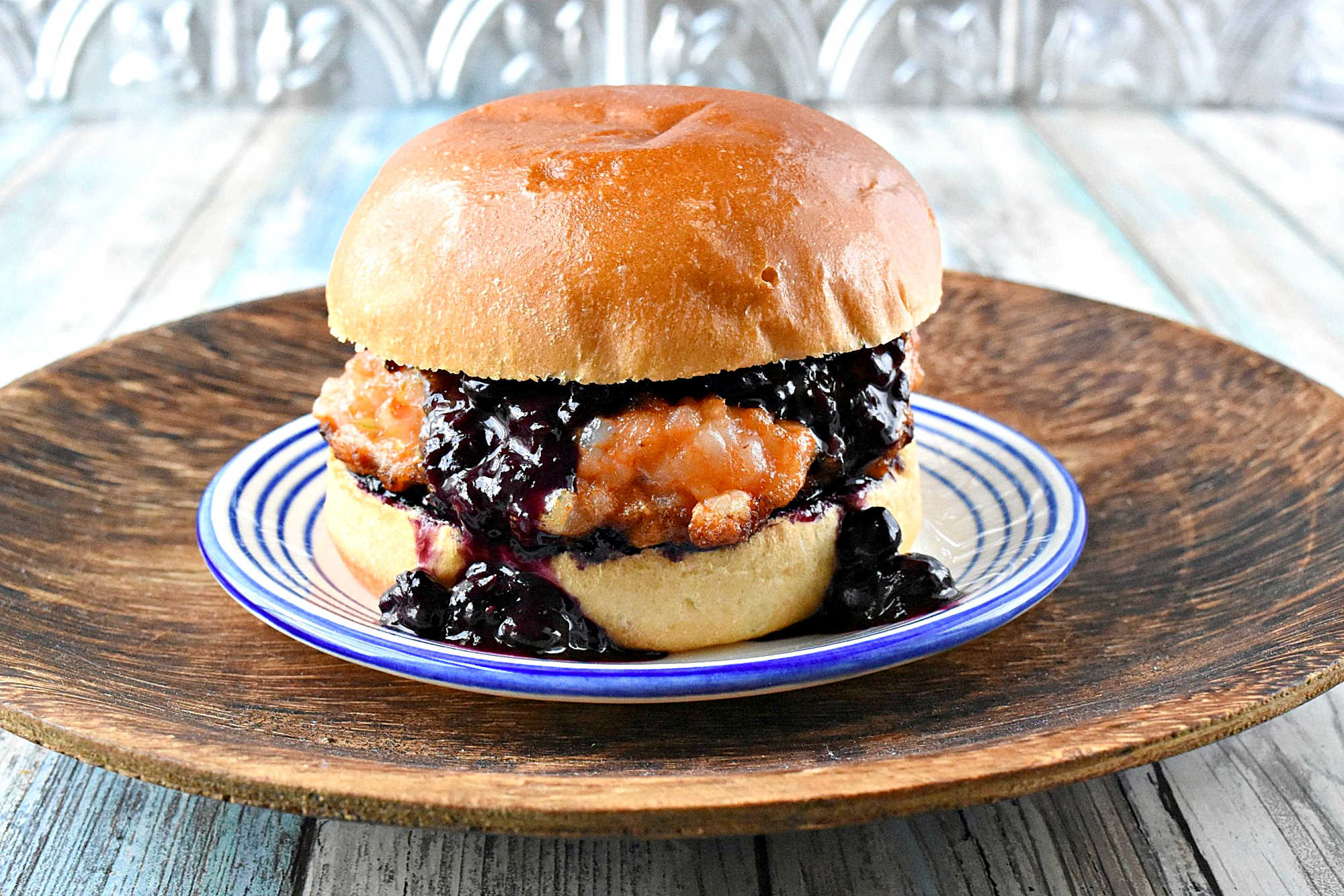 Thai Red Curry Shrimp Burger is a perfect blend of fresh shrimp and fragrant Thai red curry. This burger is sure to please seafood lovers with its combination of bold flavors and tender texture. #shrimpburger #BurgerMonth #burgerlove #redcurryshrimp #ThaiRedCurryShrimpBurger #BurgerLovers #SpicySeafood #ThaiInspiredEats