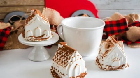 These Gingerbread House Hot Cocoa Bombs are made with white chocolate and dusted with cocoa powder. They are so much fun and so yummy!