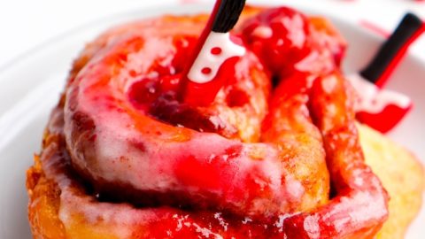 Cherry Pie Cinnamon Rolls take a murderous turn for Halloween with these super easy Cherry Pie Murdered Cinnamon Rolls that are topped with Royal Icing Knives!