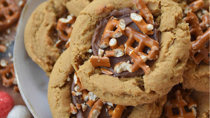 These cocoa-iced cookies with pretzels are everything you’ve ever wanted in a single treat. Get ready to fall in love.