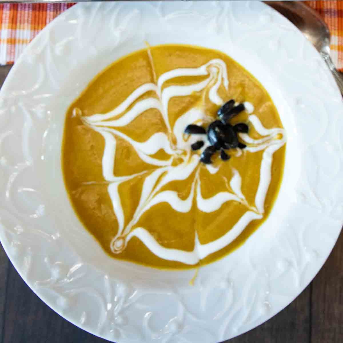Flavors of pumpkin & pear, with hints of caramel and cardamom, make this Pumpkin Pear Soup a special treat.  Add a spider web for fun!