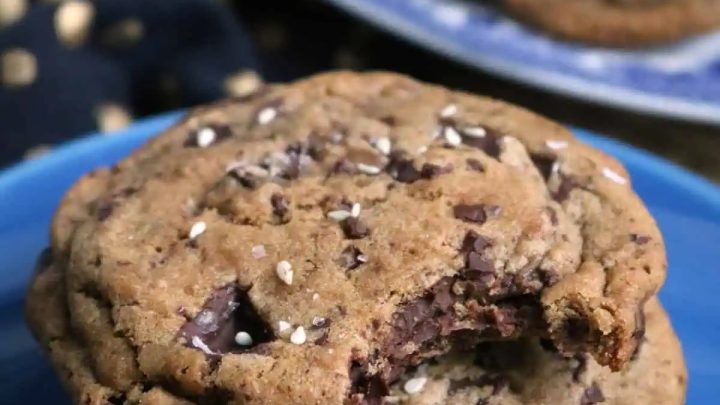 Tahini dark chocolate chip cookies are a slightly elevated version of the classic. Topped with a sprinkle of sesame seeds and a little flaky sea salt they are a touch savory but still mostly sweet.
