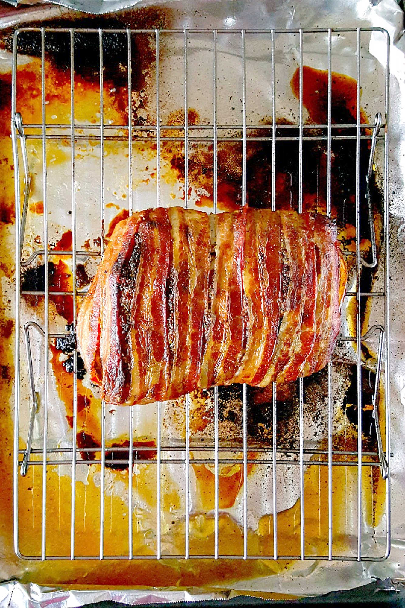 Experience layers of flavor with our Bacon Wellington Pork Roast, where savory bacon wraps perfectly seasoned pork tenderloin for an unforgettable meal. Indulge in the ultimate comfort food.  #OurFamilyTable #BaconWellington #PorkRoast #DeliciousDinner #FoodieFaves #WeeknightMeals
