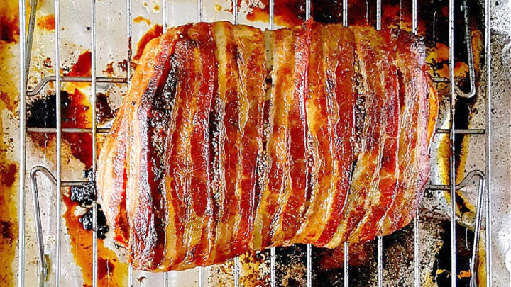 Experience layers of flavor with our Bacon Wellington Pork Roast, where savory bacon wraps perfectly seasoned pork tenderloin for an unforgettable meal. Indulge in the ultimate comfort food. #OurFamilyTable #BaconWellington #PorkRoast #DeliciousDinner #FoodieFaves #WeeknightMeals